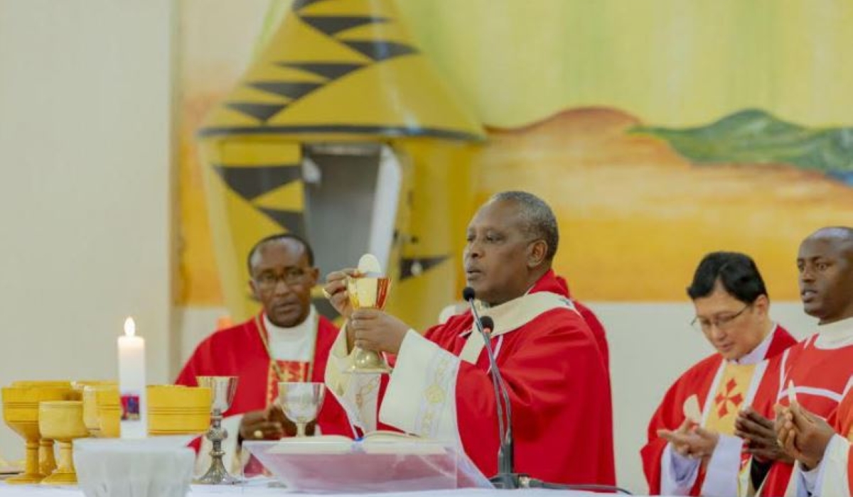 Cardinal Antoine Kambanda leads the Holy Communion mass to pray for late Pope Benedict XVI at Regina Pacis Remera on Thursday, January, 5