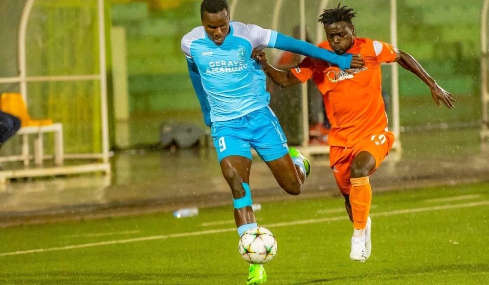 Police FC striker Onesme Twizerimana  controls the ball against AS Kigali player. The Club has canceled the contract of him and sacked  him over misconduct, with immediate effect.File