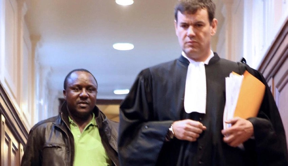 France-based genocide convict Claude Muhayimana and his lawyer. The convict Muhayimana has been released from jail and placed under judicial supervision