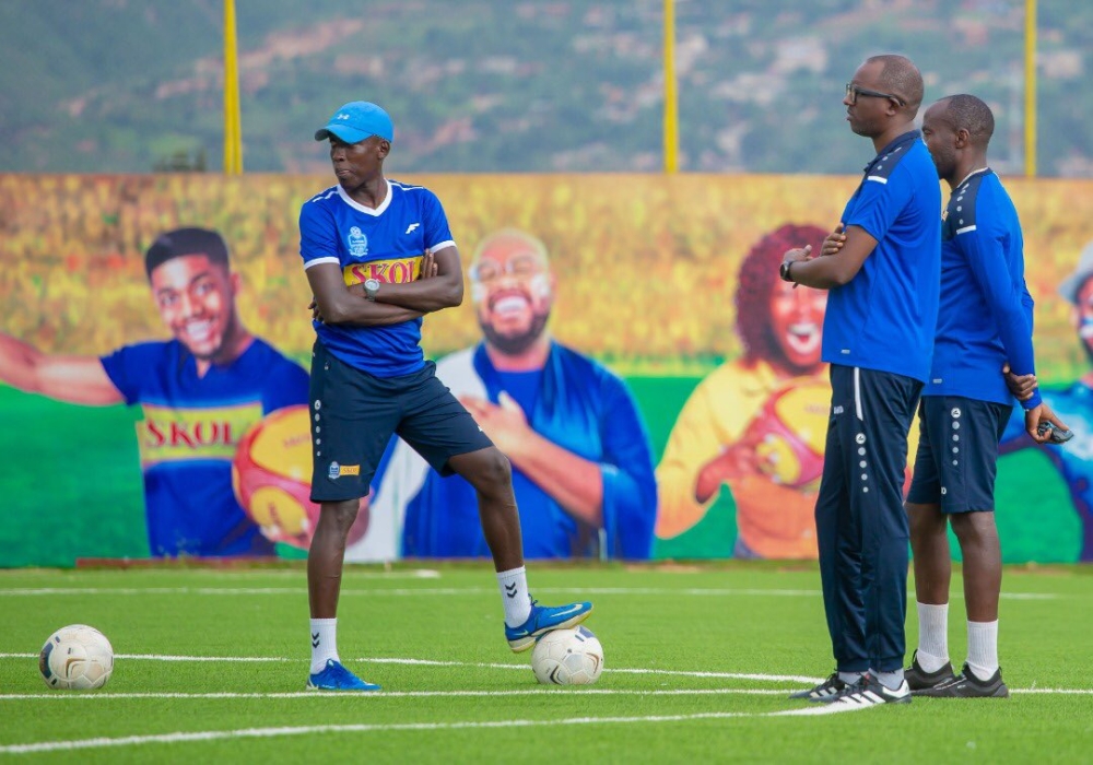 Rayon Sports head coach Francis Christian Haringingo (centre) looks how his players conduct training exercises at Nzove training stadium on Sunday, January 8. Photo: Courtesy.