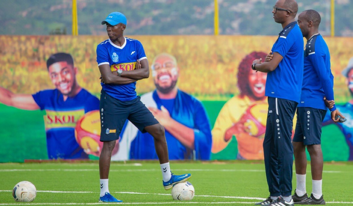 Rayon Sports head coach Francis Christian Haringingo (centre) looks how his players conduct training exercises at Nzove training stadium on Sunday, January 8. Photo: Courtesy.
