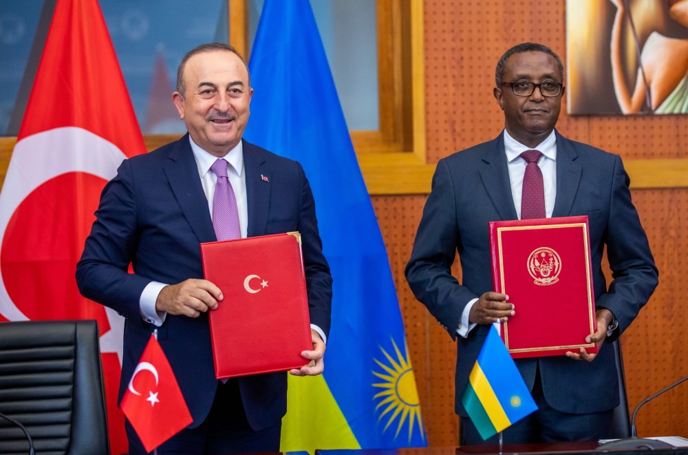 Vincent Biruta, Rwanda’s Minister of Foreign Affairs and his Turkish counterpart, Mevlüt Çavuşoğlu during the signing event in Kigali on Thursday, January 12. Photo by Olivier Mugwiza