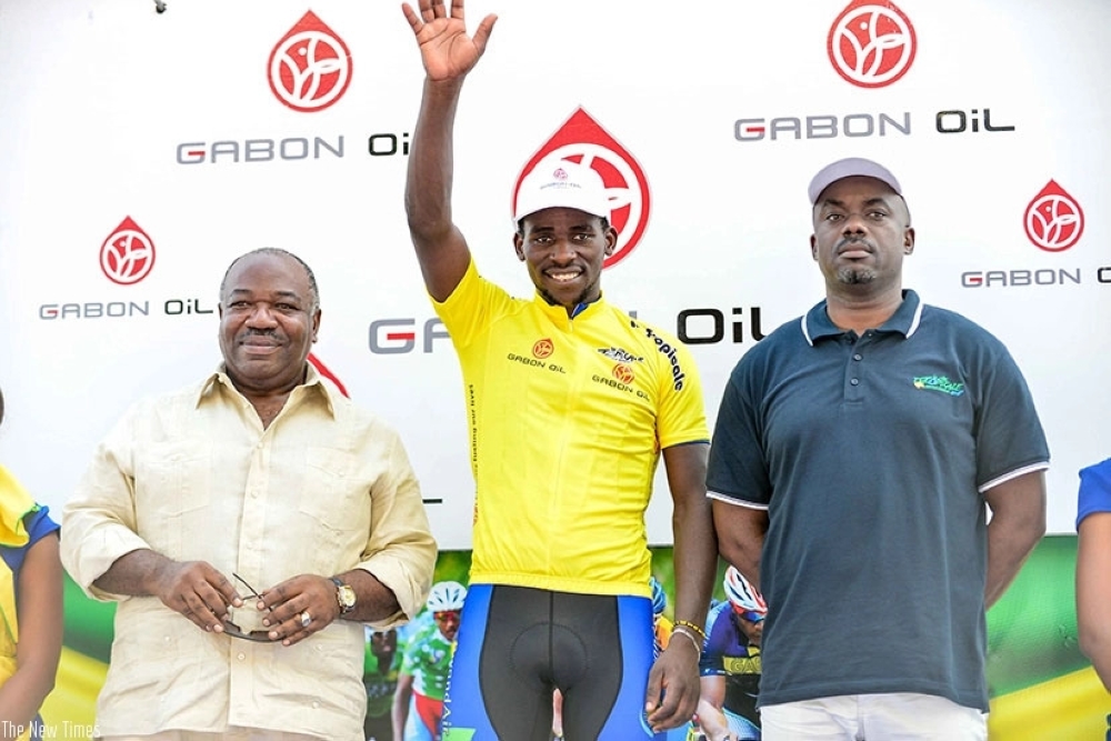 Gabonese President Ali Bongo Ondimba (L) presides over the awarding ceremony as Rwandan rider Joseph Areruya won La Tropicale in 2018. Areruya is among  six-man roster for the forthcoming La Tropicale Amissa Bongo 2023