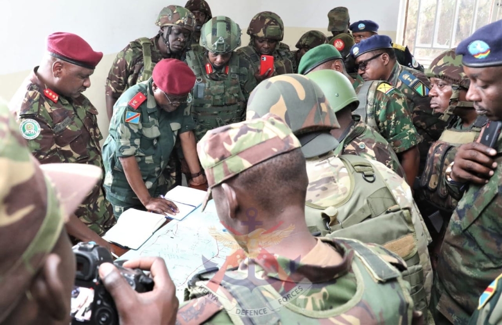 The M23 rebel group handing over Rumangabo military camp to  the EAC force in DR Congo on Thursday, January 5.
