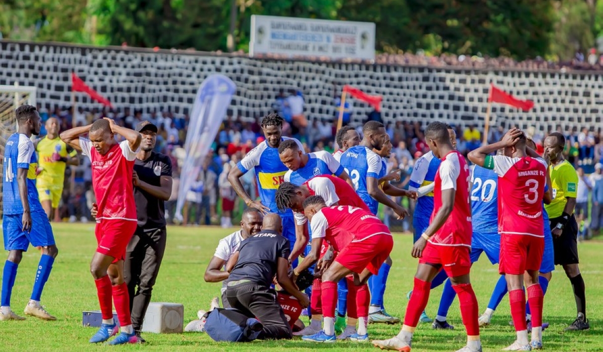 Musanze FC and Rayon Sports during the 2-0 first leg match at Ubworoherane stadium in Musanze. Photo by  Christophe Renzaho