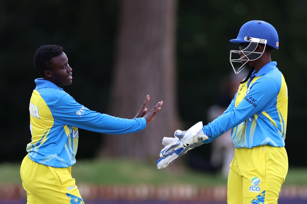 National Cricket team players during the game in which England beat Rwanda by 138 runs . Courtesy