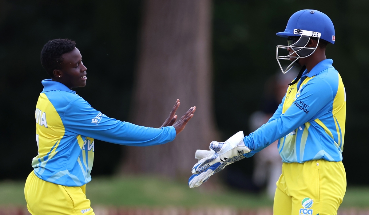 National Cricket team players during the game in which England beat Rwanda by 138 runs . Courtesy