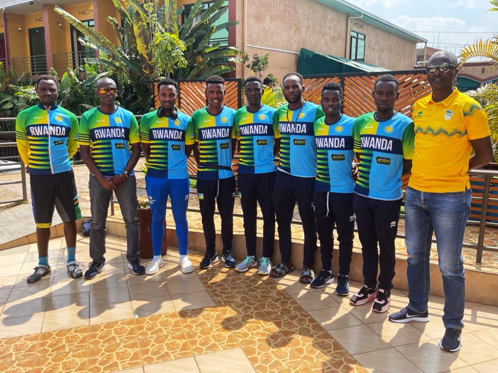 Team Rwanda head coach Felix Sempoma and his squad pose for a photo before heading to Gabon for La Tropicale 2023. Courtesy