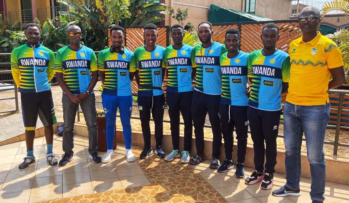 Team Rwanda head coach Felix Sempoma and his squad pose for a photo before heading to Gabon for La Tropicale 2023. Courtesy