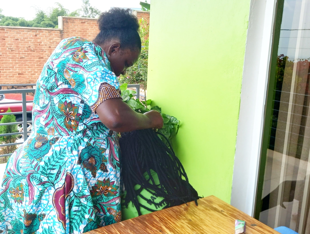 Liberate Mukamazimpa has utilised her hairdressng skills to make ends meet.