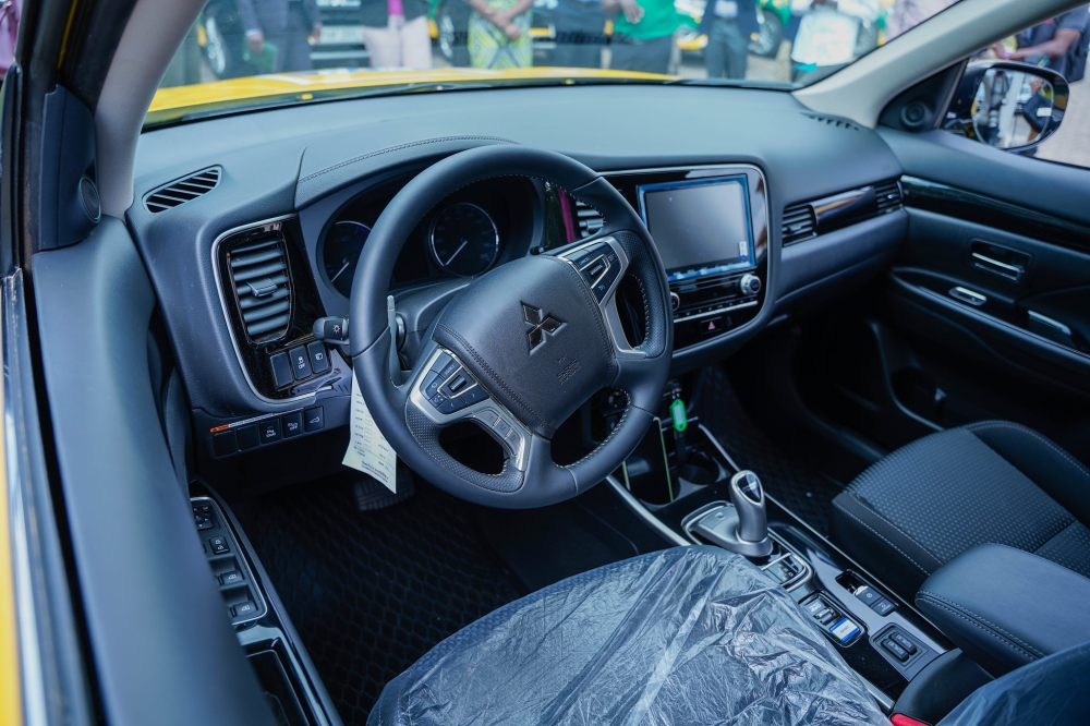 Inside the brand new car in Kigali. According to the writer&#039;s Aunt, it is not easy to boys who dare to date a girl who owns a car.  &#039;Boys will be afraid to approach you now, dear,” she lamented.