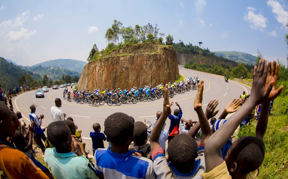 Spectators cheer on cyclists in a peloton during  the 2022 Tour du Rwanda Edition. FERWACY revealed that the 15th edition of Tour du Rwanda cycling race will cost an estimated Rwf1.4 billion. File 