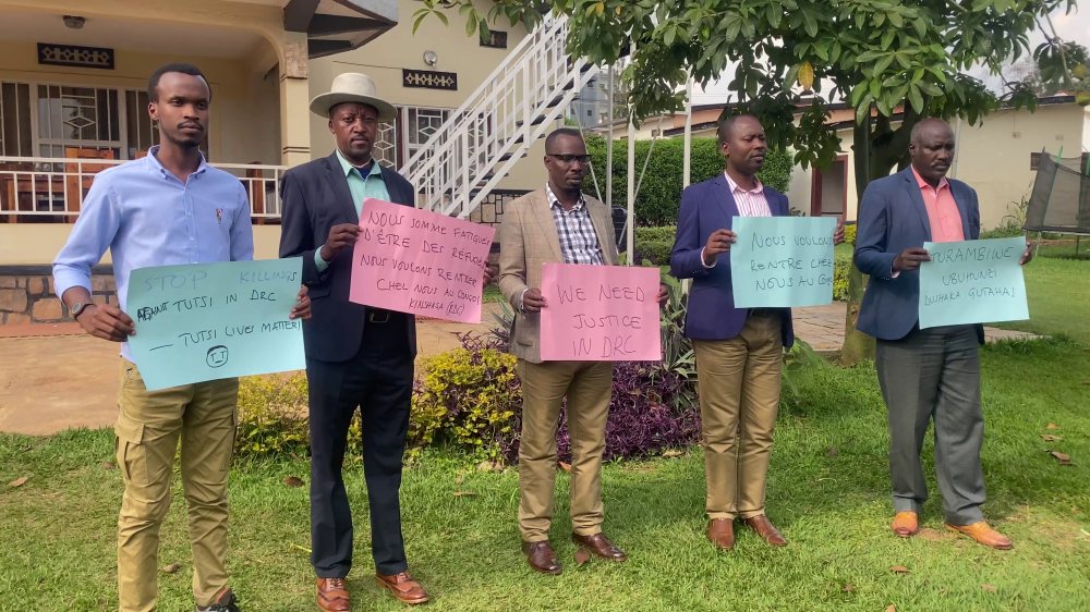 Representatives of the Congolese refugee community in Rwanda carried placards displaying the messages contained in the petition. Courtesy
