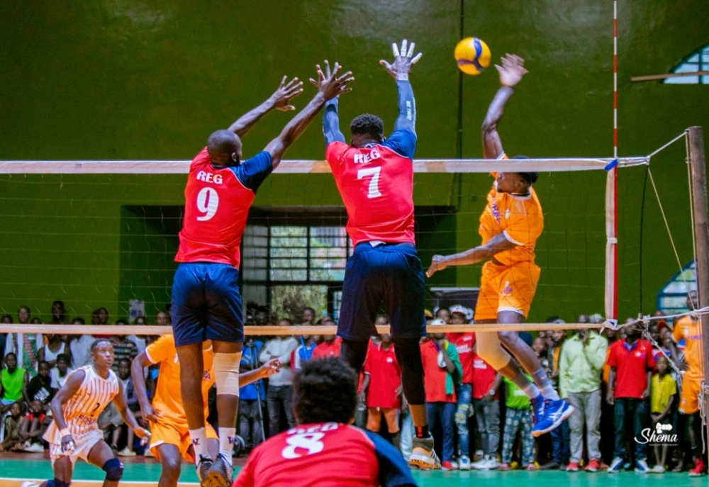 REG Volleyball club palyers try a block during the game against Gisagara last week. Courtesy