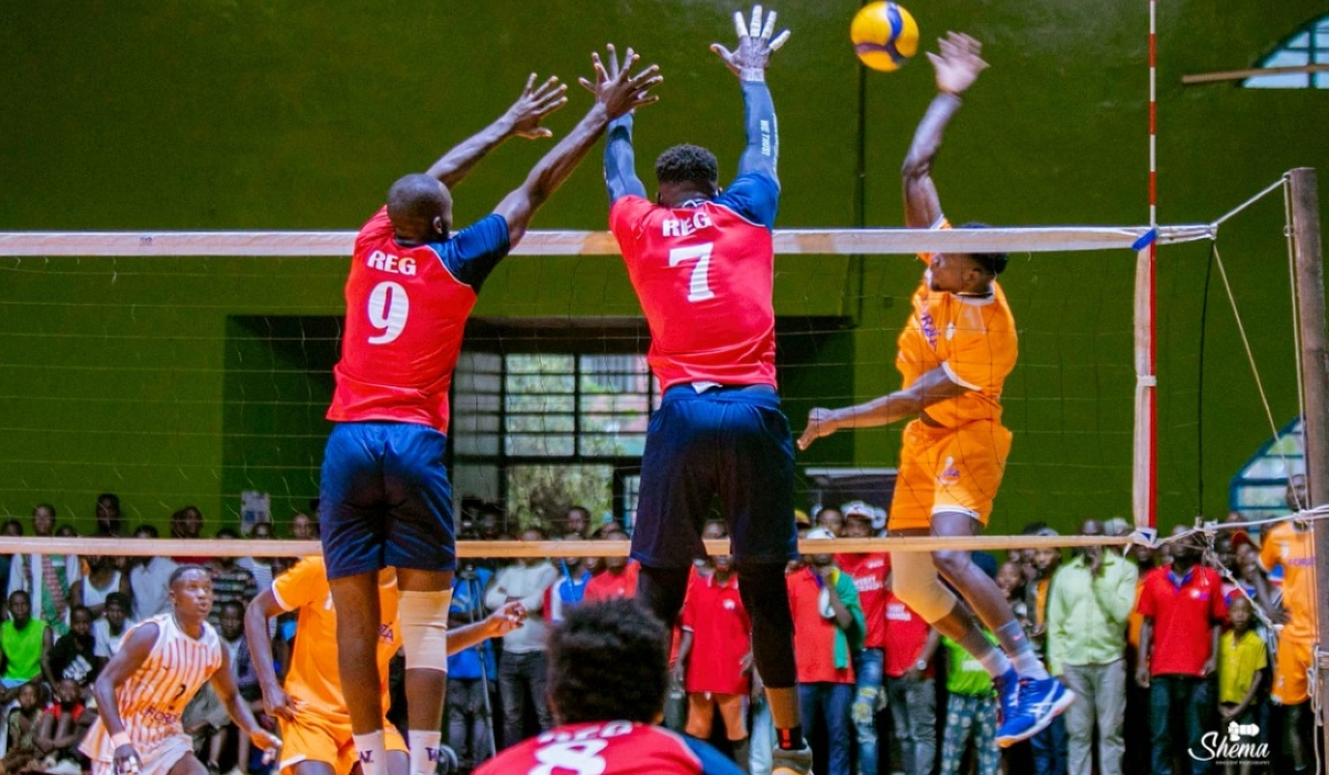 REG Volleyball club palyers try a block during the game against Gisagara last week. Courtesy