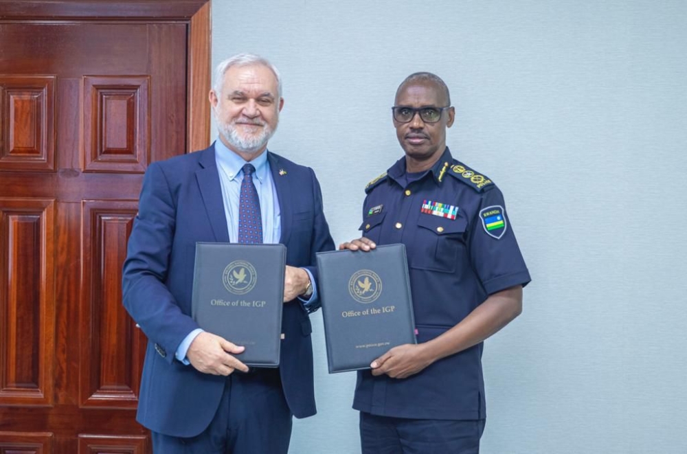 The Inspector General of Police  Dan Munyuza and Marcello Fantoni, Kent State University Vice President for Global Education after signing the agreement in Kigali on Thursday, January 26. Courtesy