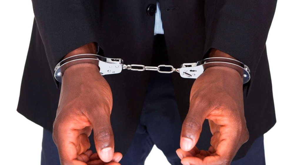 A man in handcuffs. A court in Nairobi, Kenya has jailed a Tanzanian national for the 30 years after finding him guilty of trafficking children. Photo: Shutterstock