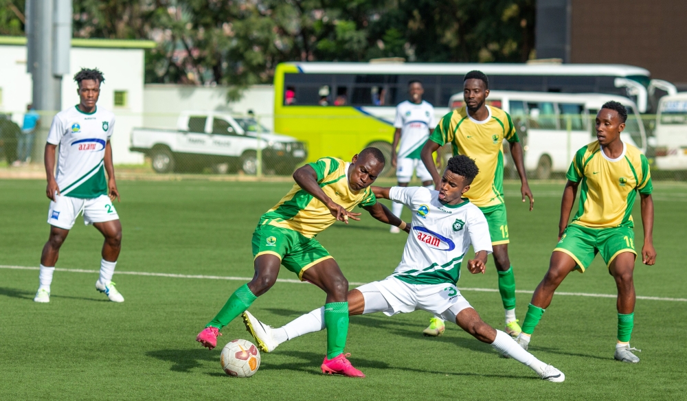 SC Kiyovu and Marine FC players vie for the ball during the first leg match. FERWAFA&#039; s disciplinary committee has ordered Kiyovu&#039;s next home match against Marine will be played behind closed doors. Ol