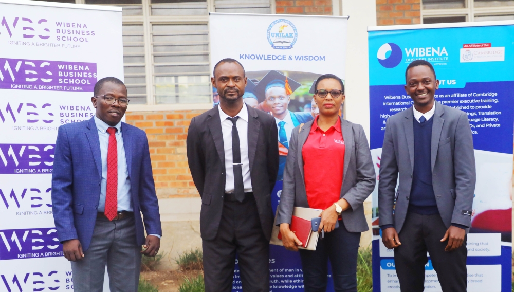 Officials pose for a photo after launching English Language Center that is  expected to facilitate staff and students acquire advanced skills in English. on Monday ,January 30. Photo by Dan  Kwizera Gatsinzi