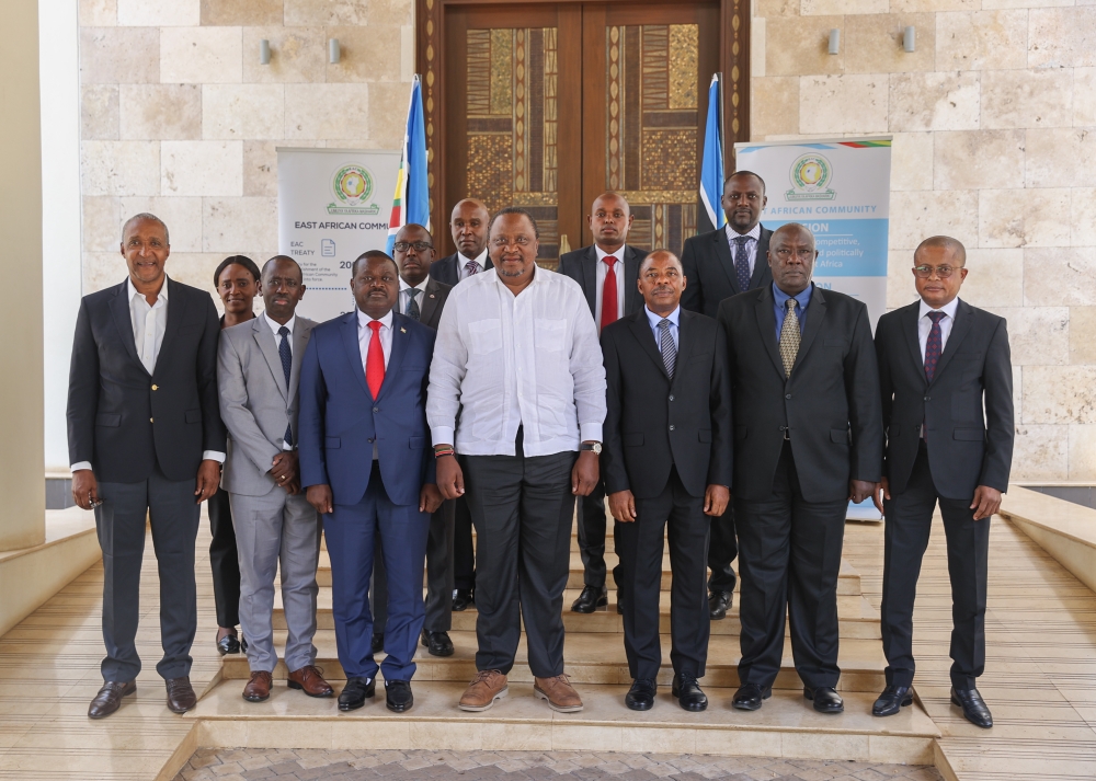 Uhuru Kenyatta, former President of  of Kenya and Facilitator of the EAC-Led Nairobi Peace Process  in a group photo with  the EAC Technical Advisory Team at a meeting  on the current state of affairs 