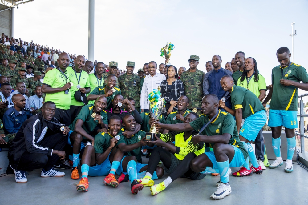 Minister of Defence Maj Gen Albert Murasira and  Rwanda Defence Force Chief of Defence Staff, Gen Jean-Bosco Kazura with other senior officers in a group photo with the winners. Republican Guard (RG) FC have retained their title for the second time in a row after beating Special Operation Forces (SOF) 2-1 in the final of the RDF Inter Force Competition 2022-2023 at Bugesera Stadium on January 31. Photo by Olivier Mugwiza