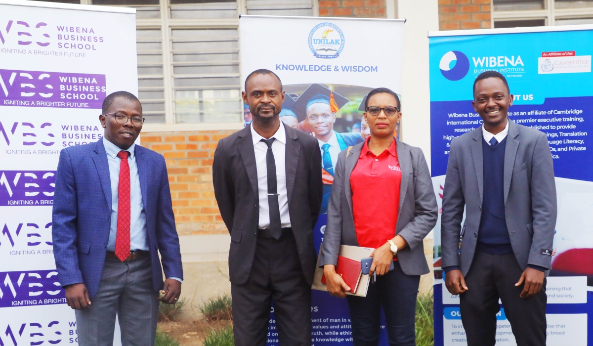 Officials pose for a photo after launching English Language Center that is  expected to facilitate staff and students acquire advanced skills in English. on Monday ,January 30. Photo by Dan  Kwizera Gatsinzi
