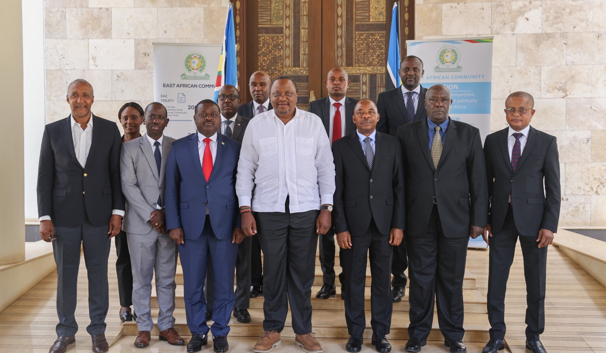 Uhuru Kenyatta, former President of  of Kenya and Facilitator of the EAC-Led Nairobi Peace Process  in a group photo with  the EAC Technical Advisory Team at a meeting  on the current state of affairs 