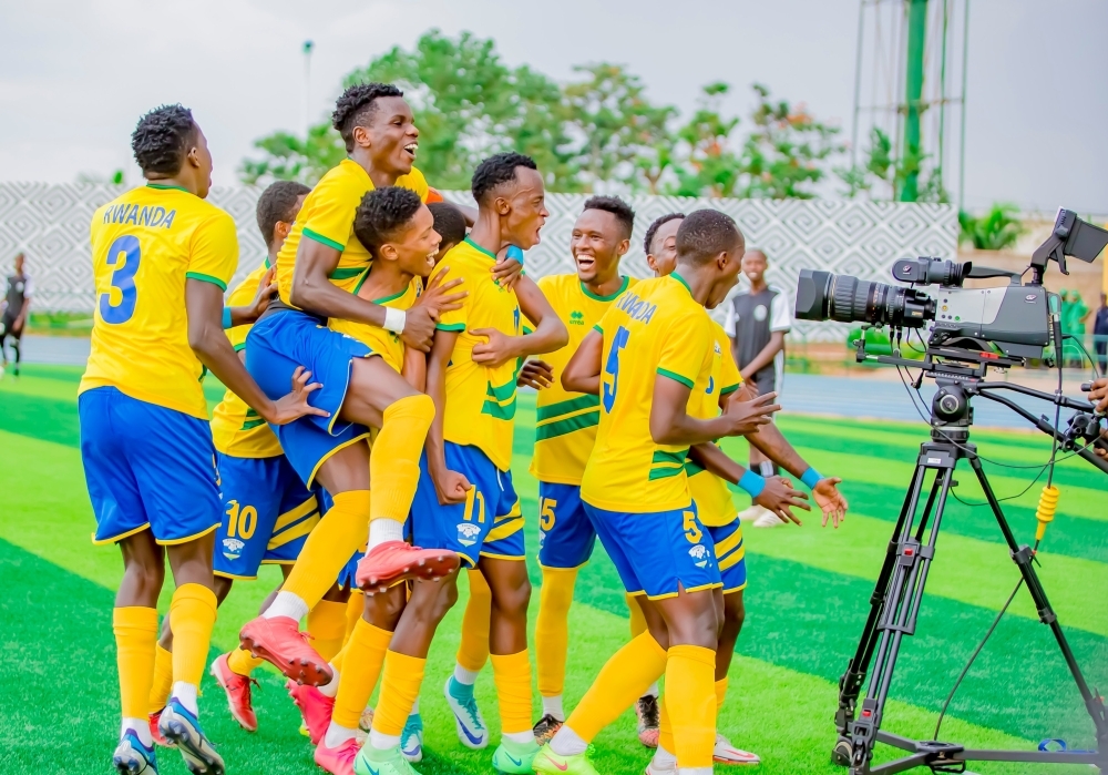 U-23 national team players celebrate the second goal during the match against Libya at Huye stadium. FERWAFA has revealed that the Huye based stadium is ready to host AFCON matches. File
