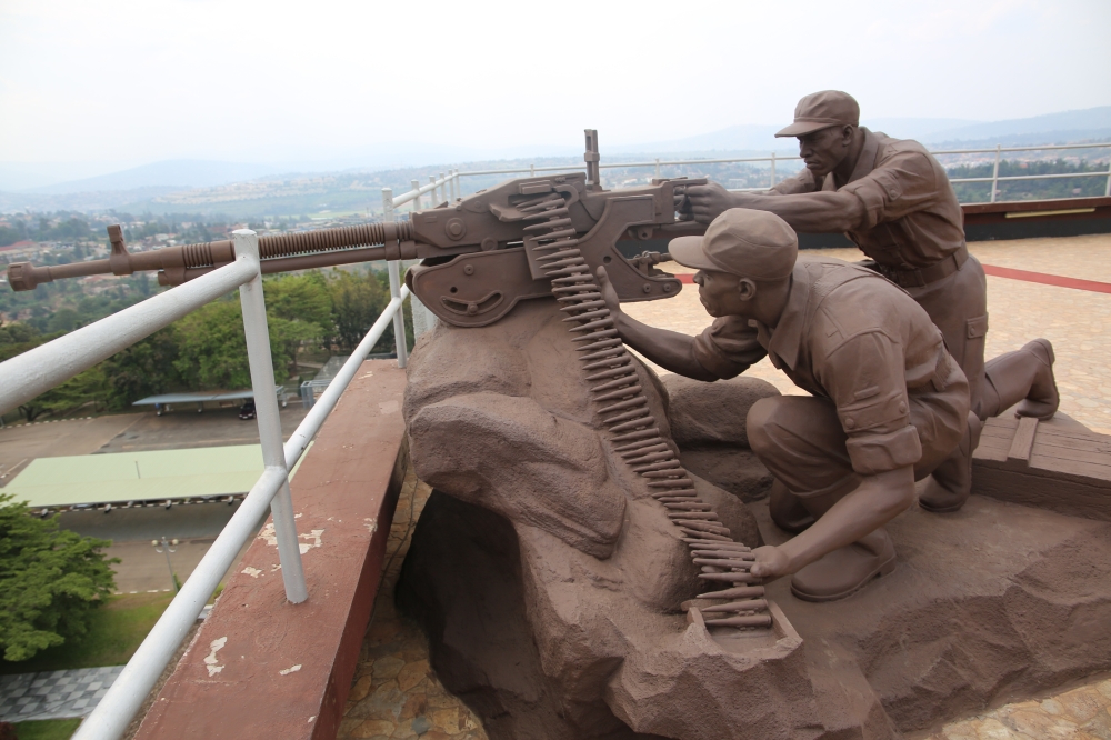 A monument that depicts two RPA soldiers using a machine gun at the parliament building during the Liberation war. Photo by Craish Bahizi