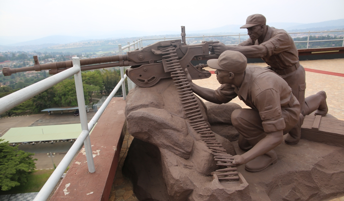 A monument that depicts two RPA soldiers using a machine gun at the parliament building during the Liberation war. Photo by Craish Bahizi