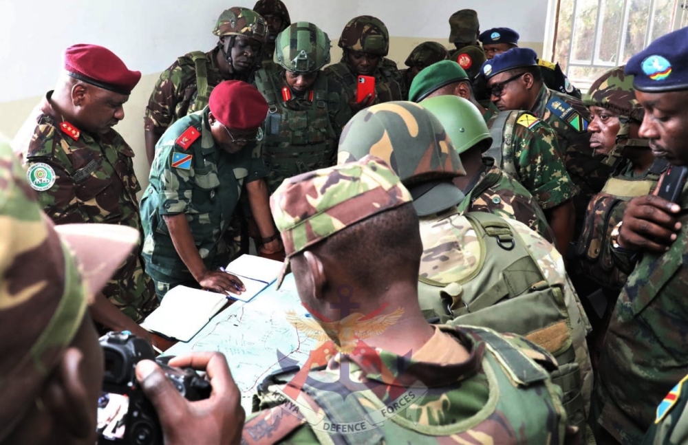 The EAC regional force and M23 rebel group representatives during the handover of Rumangabo military camp  in DR Congo on Thursday, January 5. EAC seeks ‘urgent clarification’ on deported Rwandan officers. Courtesy