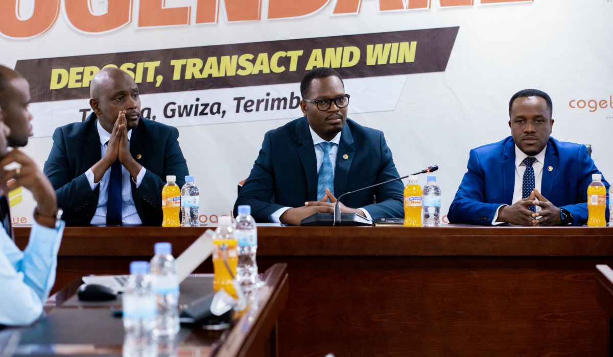 Cogebanque officials during the launch of Tugendane Campaign on February 2. Cogebanque has 28 branches, more than 600 agents and 36 ATMs across the country. Dan Kwizera.