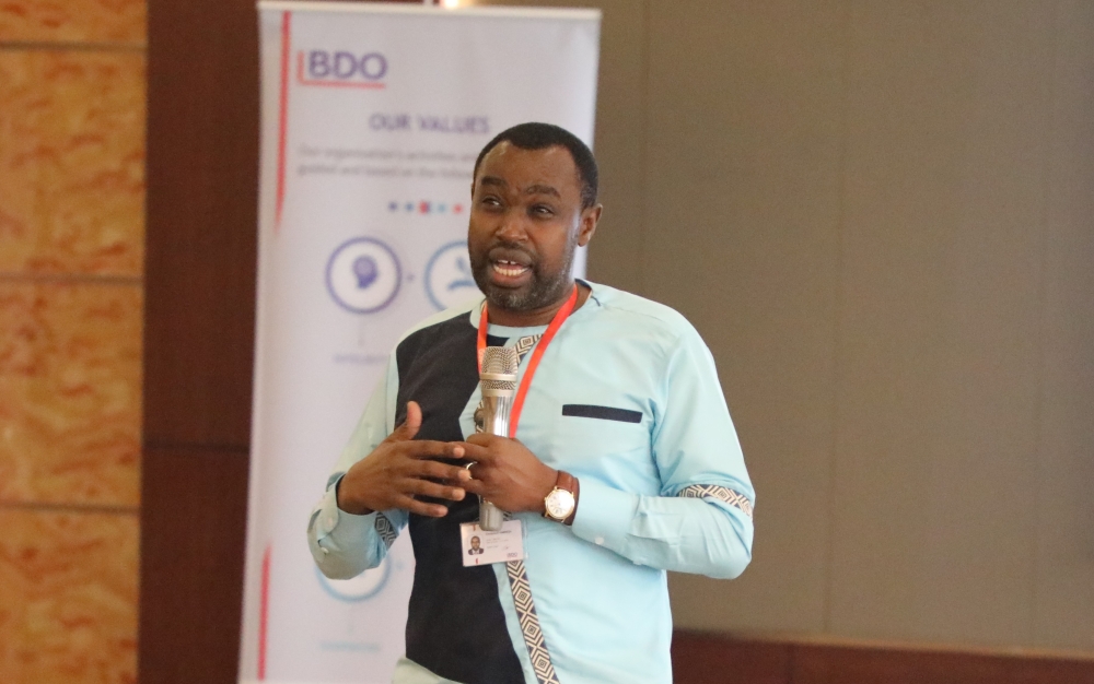 Managing Partner of BDO EA Rwanda Limited, Emmanuel Habineza addresses trainees during the workshop. Craish BAHIZI