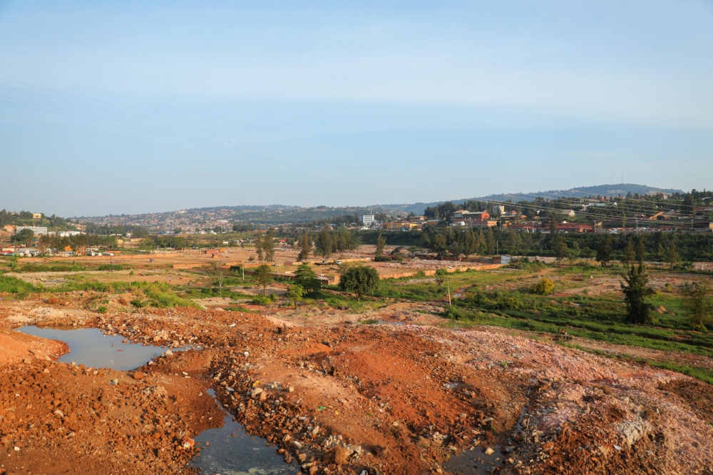 A landscape view of former Gikondo industrial park after demolishing properties to conserve wetlands in Kigali City. Craish Bahizi