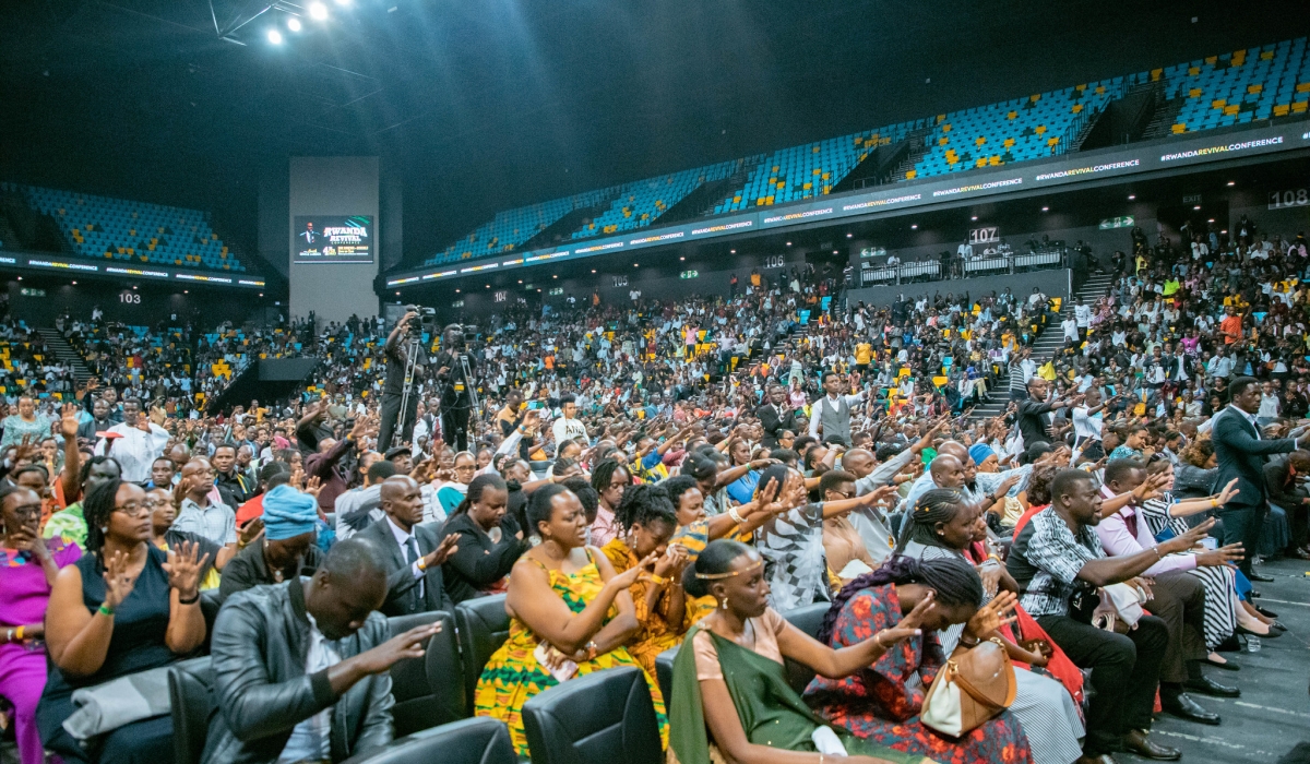 Thousands of believers during a prayer session at the long awaited Rwanda Revival Conference that saw a multitude of believers from Rwanda and neighbouring countries flock BK Arena on February 4. All Photo by Dan Kwizera Gatsinzi
