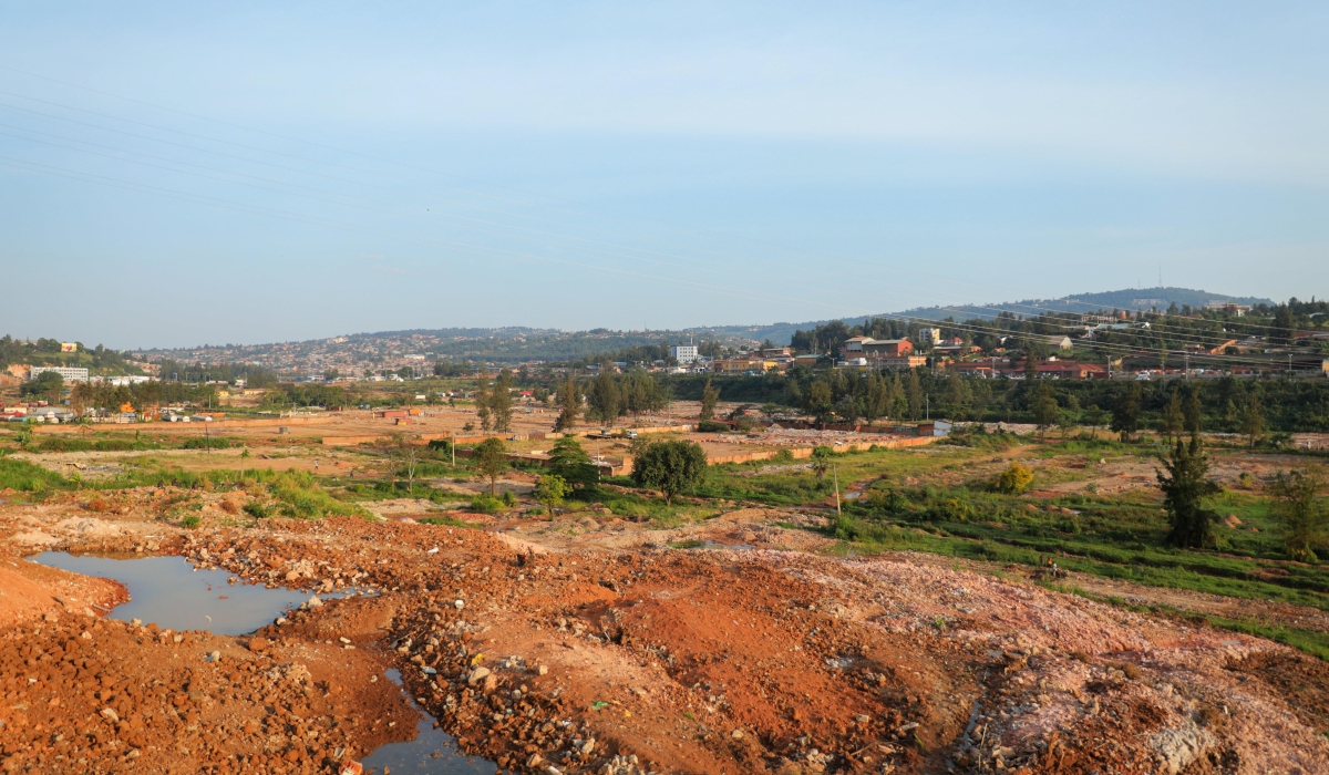 A landscape view of former Gikondo industrial park after demolishing properties to conserve wetlands in Kigali City. Craish Bahizi