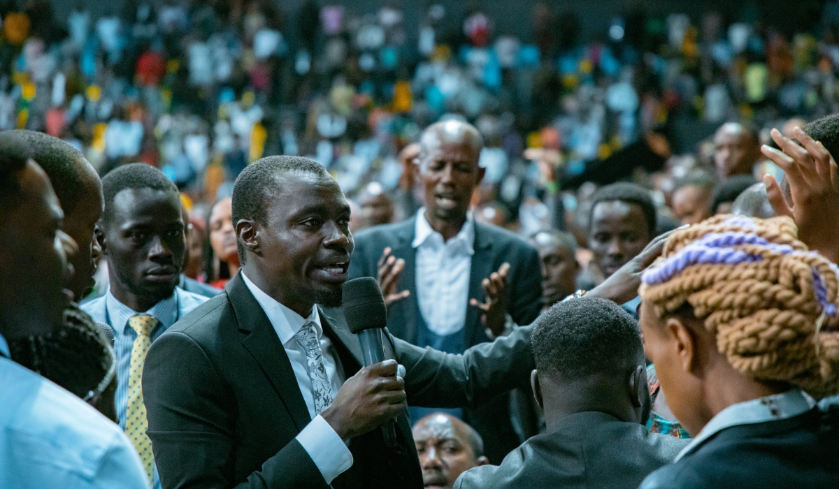  Apostle Grace Lubega during a healing session  at the long awaited Rwanda Revival Conference that saw a multitude of believers from Rwanda and neighbouring countries flock BK Arena on February 4. All Photo by Dan Kwizera Gatsinzi