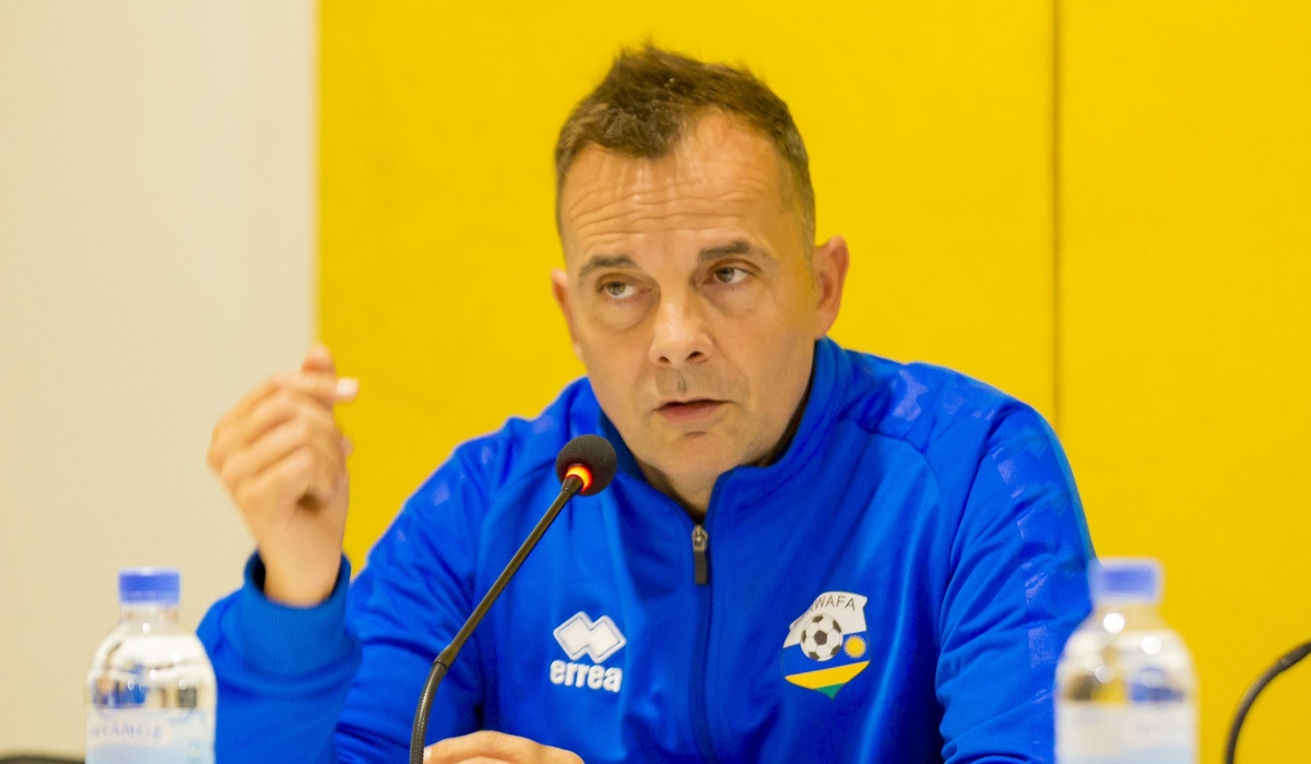 Amavubi head coach Carlos Alos Ferrer speaks to journalists during a press briefing. Courtesy