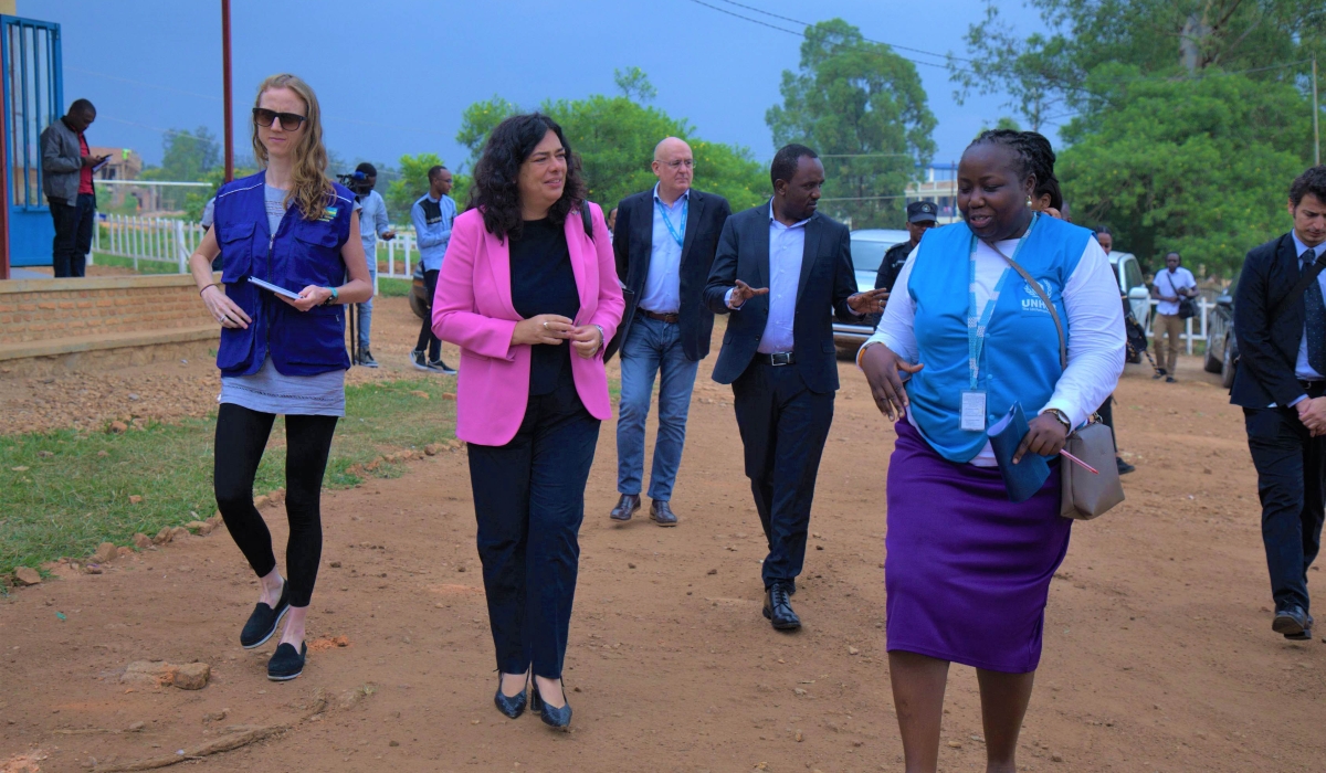 EU Ambassador to Rwanda Belén Calvo Uyarra interacts with the UNHCR Representative Grace Atim flanked with other officials during a guided tour of the Emergency Transit Mechanism  centre in Gashora, Bugesera on February 9. All photos by Craish Bahizi