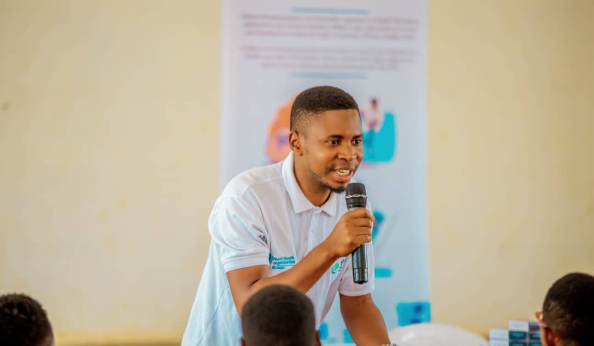 Benoit Ndajimana during a presentation. He has created an environment for young people to learn about sexual and reproductive health albeit through a card game. Courtesy