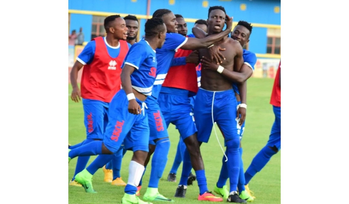 The Ghanaian striker Michel Sarpongo and teammates celebrate. He was the hero in Rayon Sports’ 1-0 win against APR FC on April 21, 2019 as the Blues” went on to win the league trophy. File