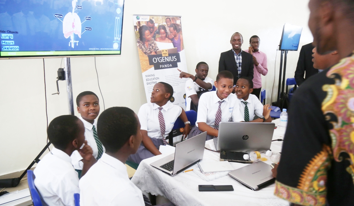 FAWE Girls School students learning biology during the launch of TEST program (tech-enabled STEM teaching ) in Kigali in 2020. Photo by Craish Bahizi