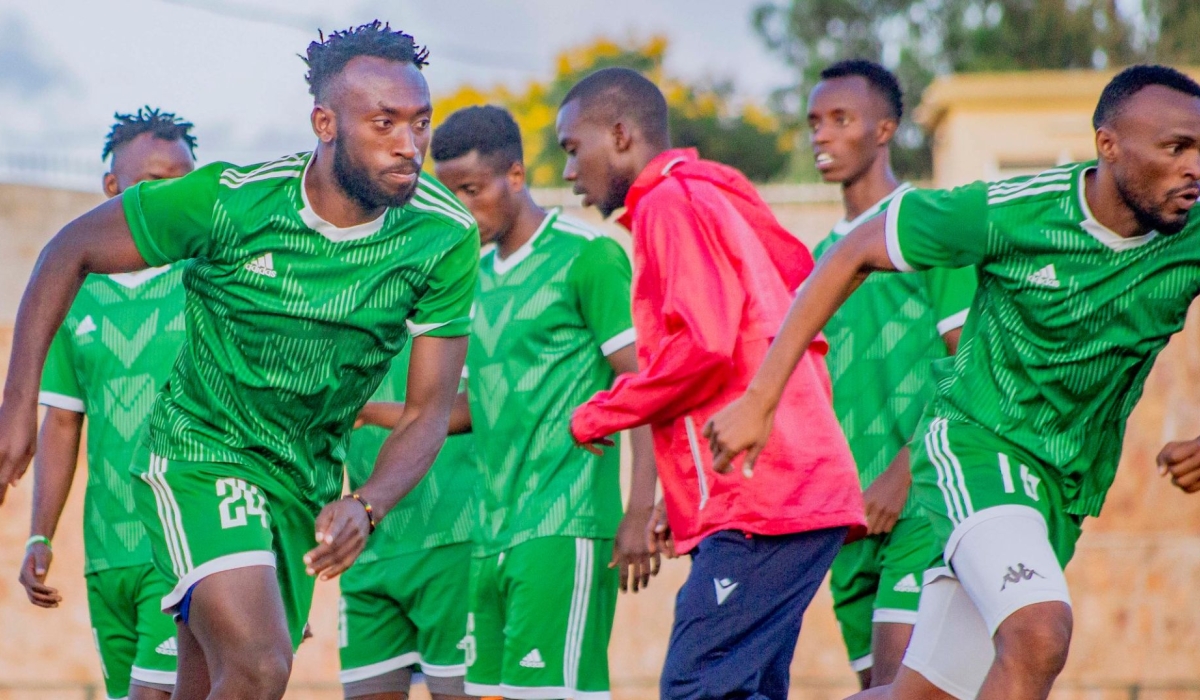 AS Kigali players during a warm-up exercises before the game at Muhanga stadium. The City of Kigali sponsored team will face Gorilla in must-win tie. Courtesy