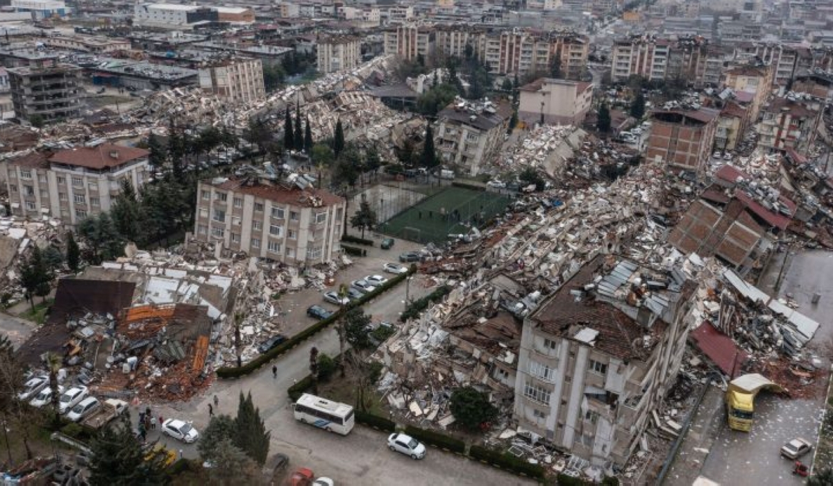 An aerial view of debris of collapsed buildings after a 7.8 magnitude earthquake hit Turkey and Syria on February 6, 2023. (Photo by Ercin Erturk/Anadolu Agency via Getty Images)