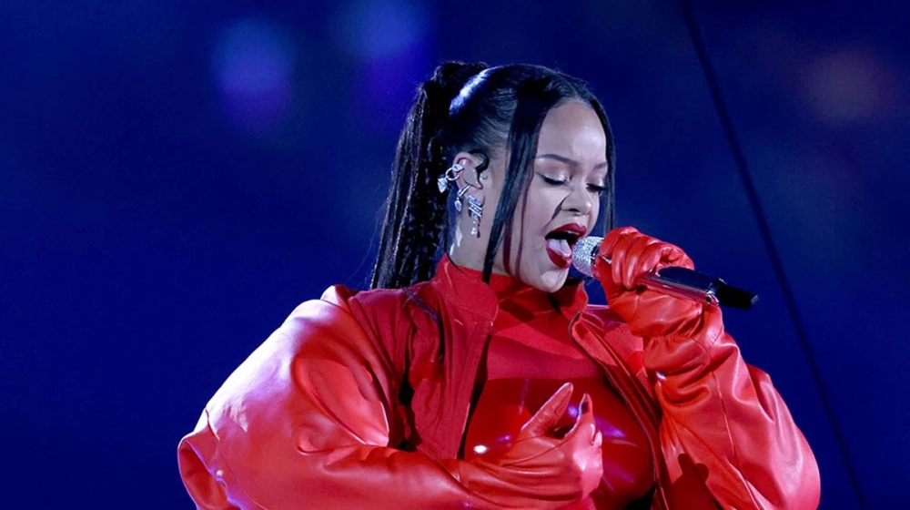 Rihanna revealed baby bump at the SuperBowl halftime show.