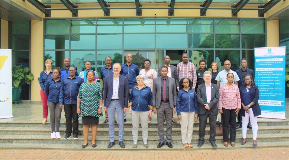 Enabel staff and City of Kigali officials pose for a group photo after touring different development activities supported by Enabel