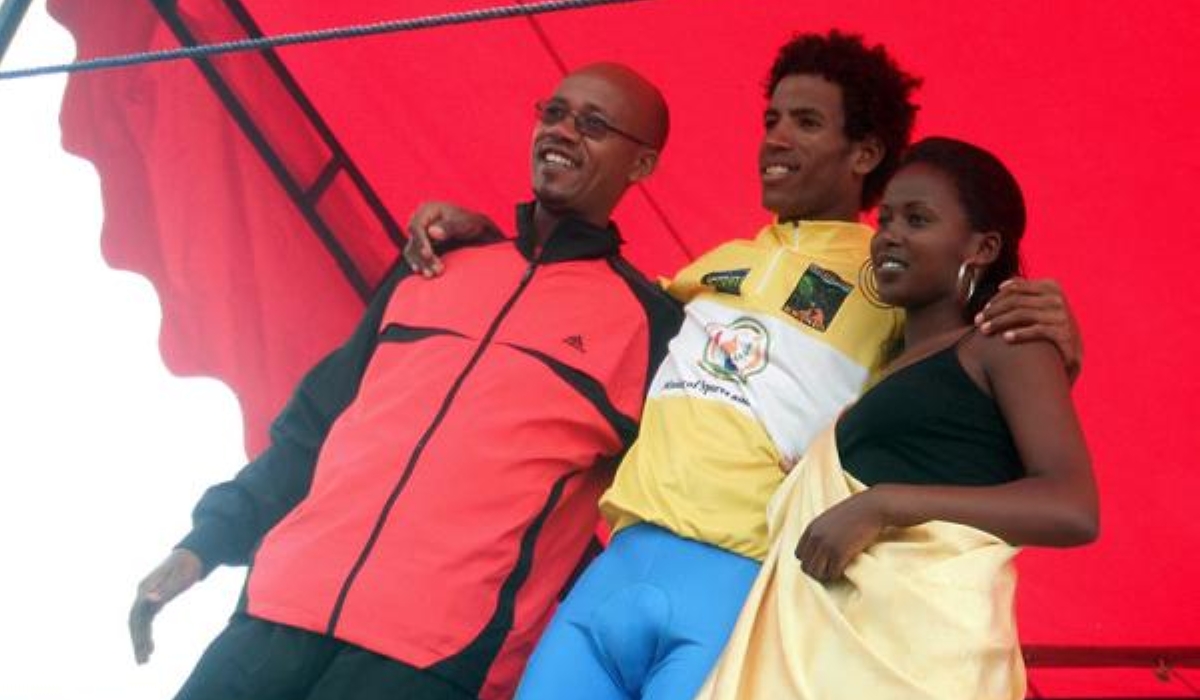 Former President of FERWACY Aimable Bayingana pose for a picture with the Eritrean Daniel Teklehaimanot, the winner of Tour du Rwanda 2010 during the awarding celemony. The cycling legend  will participate at Tour du Rwanda 2023 edition. File