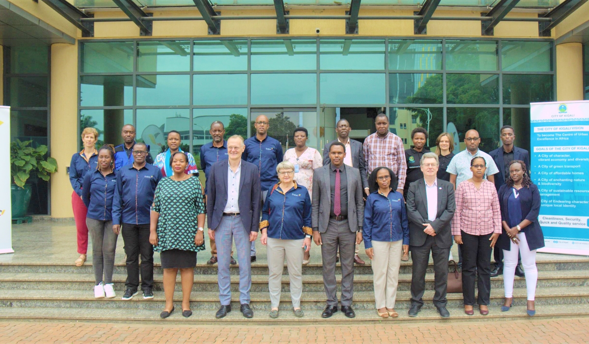 Enabel staff and City of Kigali officials pose for a group photo after touring different development activities supported by Enabel