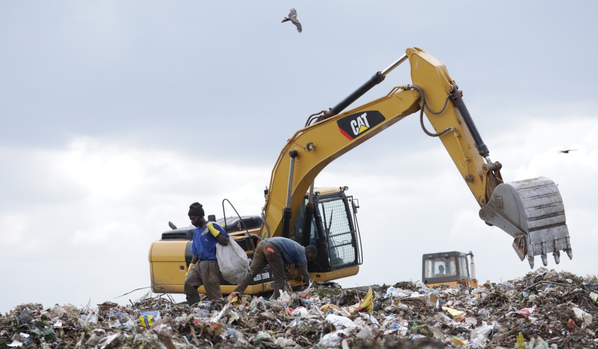 Workers sort garbage at Nduba landfill in Gasabo District inKigali. According to the city official more than Rwf3 billion is needed for expropriation to pave way for the construction of Nduba modern sa
