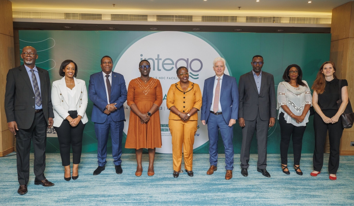 Officials pose for a group photo during the launch. The Public sector is urged to participate in projects aimed to boost Rwanda’s climate action plan.